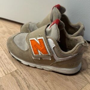 Gently used New Balance 574